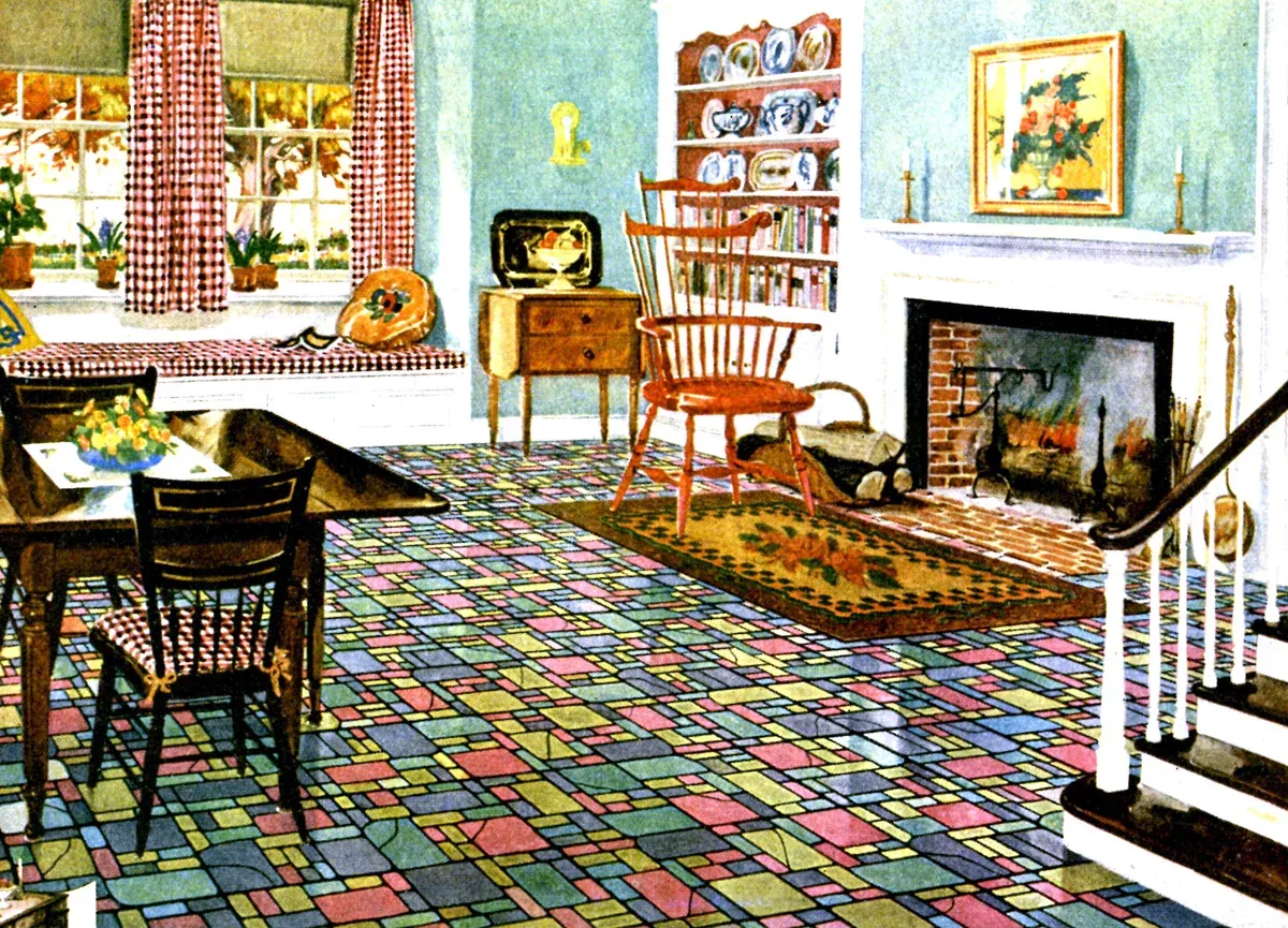 1928 magazine illustration of a living room with a multicolored patterned linoleum floor, a braided rug, a fireplace and a dining table